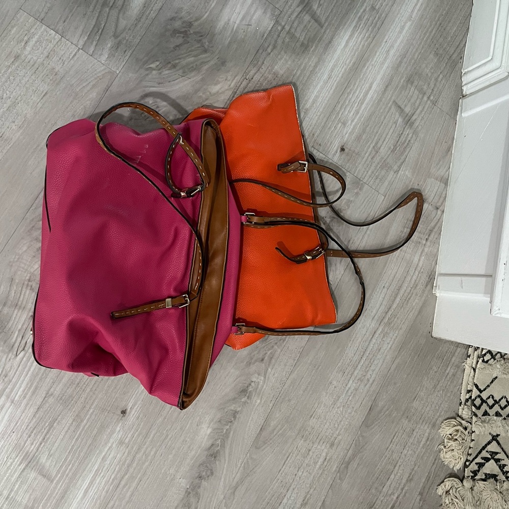2 leather purses in pink and orange